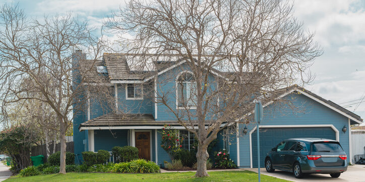beautiful houses with nicely landscaped front the yard in small town in california, street view