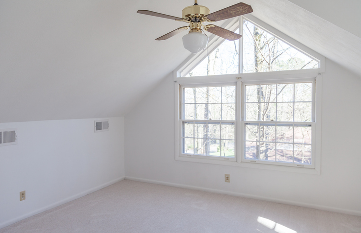 Interior of a modern Clovis home with high ceilings showing HVAC vents